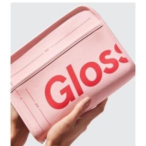 Glossier makeup bag in pink